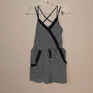 Never worn, cute black and white xhilaration romper